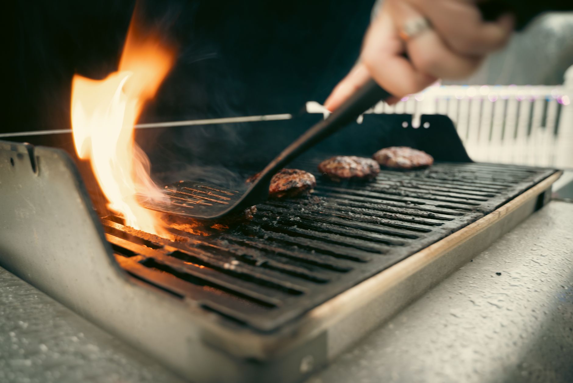 Burgers cooking on a grill